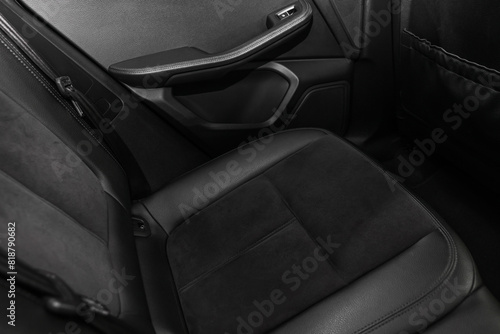 Leather seat inside of modern black car, closeup © New Africa