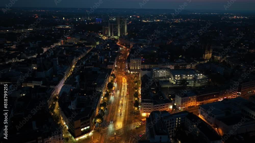 Aerial time lapse or hyperlapse of the skyline of Bonn, Germany at night. Flying over the Kennedybrucke into the center. Aerial time lapse or hyperlapse of the skyline of Bonn, Germany at night. Flying over the Kennedybrucke into the center.