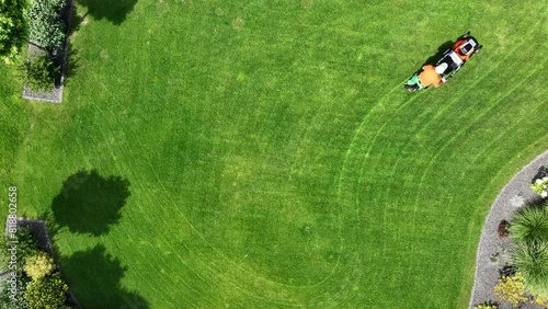 Aerial View of Lawn Mowing by Caucasian Gardener