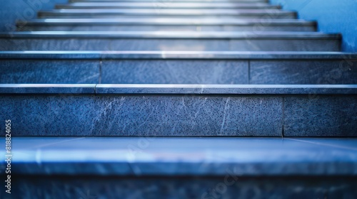 A close-up view of an empty staircase with metal railings  providing a sense of ascension or progress