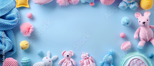 Adorable baby toys and clothes on pastel background