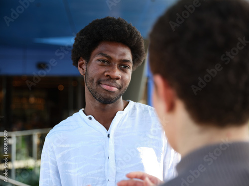 Man having a conversation outside photo