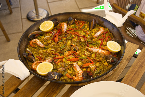 Paella is a rice dish originally from the Valencian Community. Paella is one of the best-known dishes in Spanish cuisine.