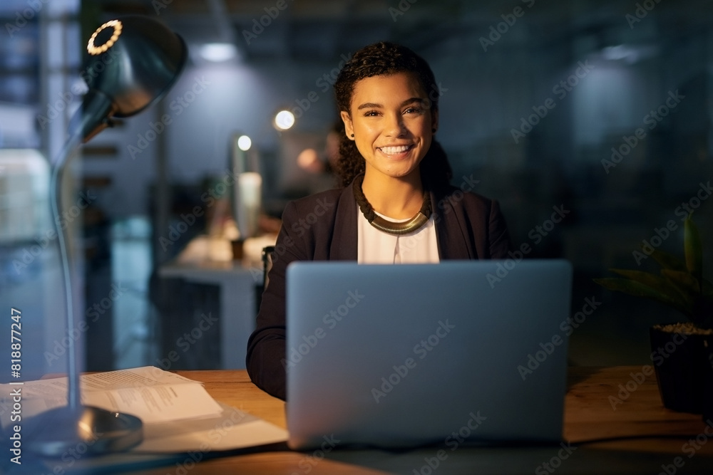 Business woman, portrait and night with laptop at desk for project deadline, review or update records. Late, smile and employee with paperwork for overtime, happiness or data entry clerk in office Business woman, portrait and night with laptop at desk for project deadline, review or update records. Late, smile and employee with paperwork for overtime, happiness or data entry clerk in office