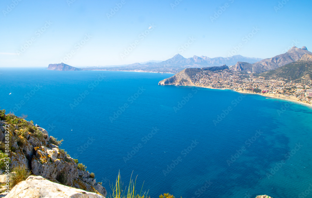 Fototapeta premium Peñón de Ifach Natural Park (Penyal d'Ifac) , Small nature reserve with a large limestone outcrop, trails and panoramic views of Calpe, Mediterranean coast of Alicante and the Gulf of Valencia, Spain.