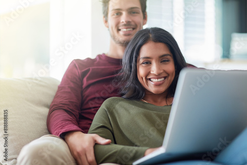Couple, remote work and woman with portrait in home, laptop and working with help and relax on sofa. Freelancer, entrepreneur and girl with man, computer and apartment of editor and writer online