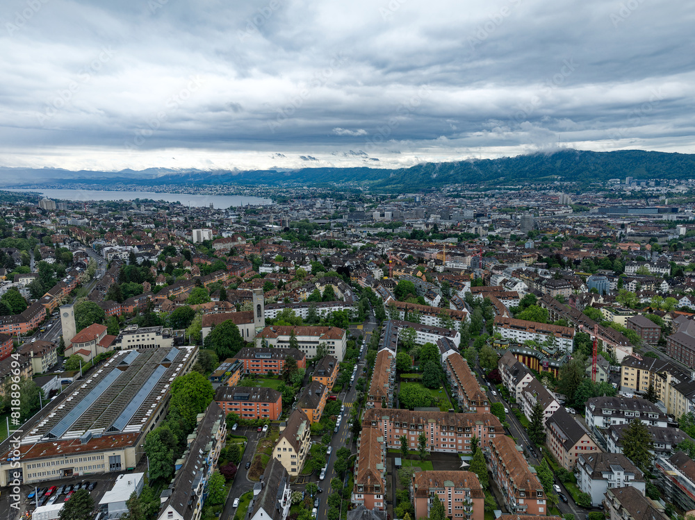 Aerial view of Swiss City of Zürich with cityscape and skyline with Lake Zürich in the background on a cloudy spring day. Photo taken May 17th, 2024, Zurich, Switzerland. Aerial view of Swiss City of Zürich with cityscape and skyline with Lake Zürich in the background on a cloudy spring day. Photo taken May 17th, 2024, Zurich, Switzerland.