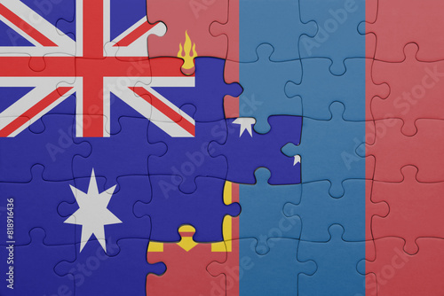 puzzle with the colourful national flag of mongolia and flag of australia.