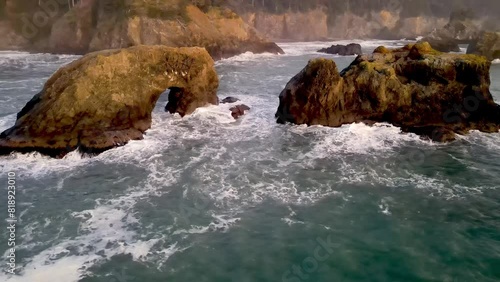 Aerial of the rugged coastline of Oregon, USA at Sunset.