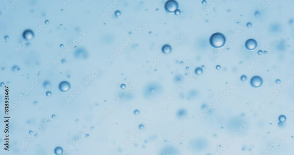 Many water bubbles in blue water close up, abstract water wave with bubbles in slow motion. Many water bubbles in blue water close up, abstract water wave with bubbles in slow motion.