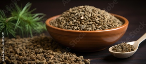Ajwain also referred to as Ajowan Caraway or Trachyspermum Ammi placed in a bowl with a copy space image photo