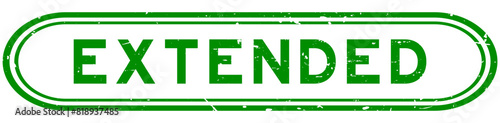 Grunge green extended word rubber seal stamp on white background