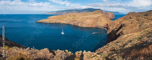 Panoramic view of Cape Ponta de Sao Lourenco, Canical, East coast of Madeira Island, Portugal. Scenic volcanic landscape of Atlantic Ocean, rocks and cllifs and sky. Seen from popular hiking trail PR8 © Kristyna