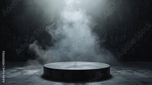 A spotlight shines down on a small, round stage