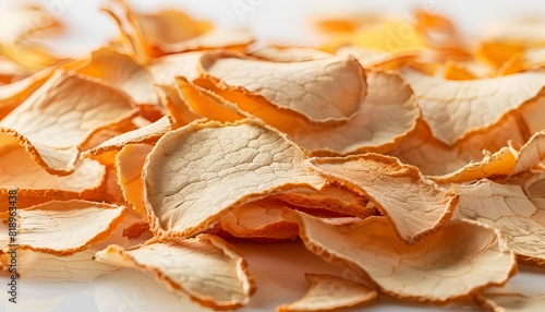 Many dry orange peels on white table  closeup