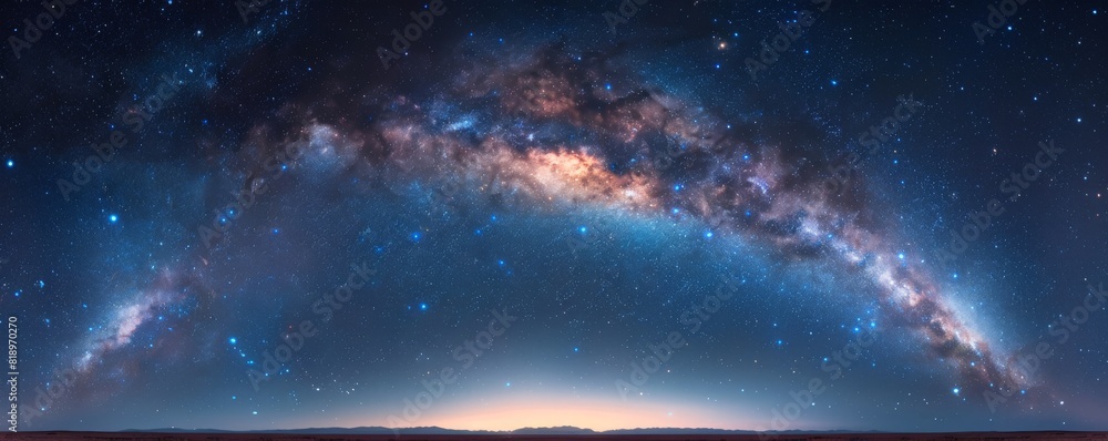 The Milky Way galaxy stretching across the night sky, with a clear view of its spiral arms.