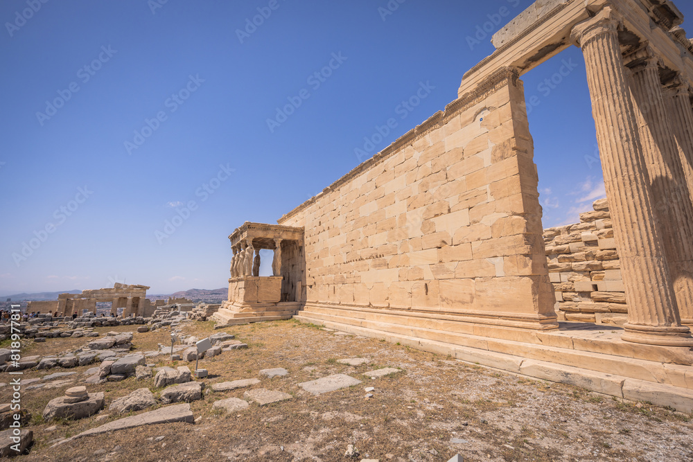 Obraz premium Athens, Greece, May 3rd 2024: The Mighty UNESCO Acropolis of Athens, in the center of Athens, Greece