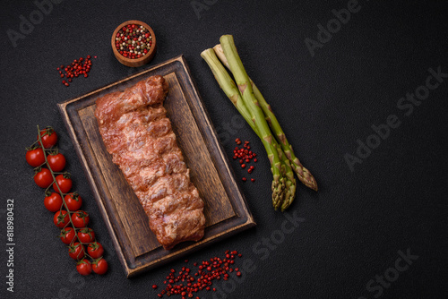 Raw pork ribs marinated with salt, spices and herbs