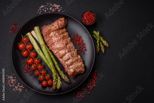 Raw pork ribs marinated with salt, spices and herbs