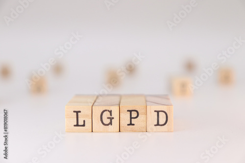 LGPD letter. Concept of brazilian data protection law written on wooden cubes isolated on white background.
