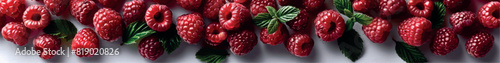 Juicy raspberries. Red raspberries on a white background for banner, cover, label. Frozen raspberries in powdered sugar. Raspberry juice, jam, dessert. Berry background. Fruit background.