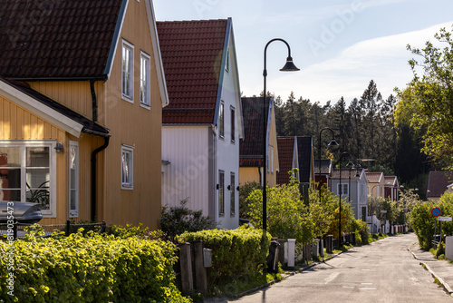 Stockholm, Sweden Residential houses on a street  in the green and leafy upscale Gamla Enskede district south of town.