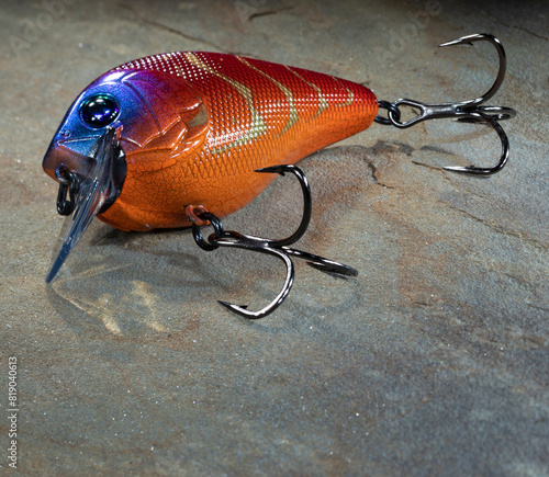 Orange fishing lure with copy space