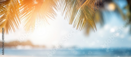 Sand with blurred Palm and tropical beach bokeh background Summer vacation and travel concept Copy space