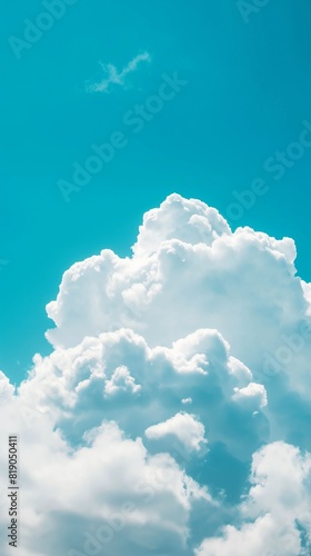 Vertical Image Of A Blue Sky With Fluffy Clouds.