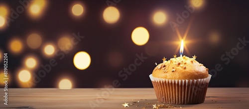 Festive Happy birthday background with number or digit 57 Postcard with a muffin and burning candles Festive copy space background