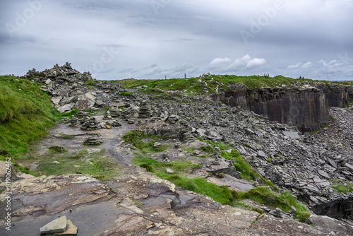 Grass-Covered Rocky Cliff