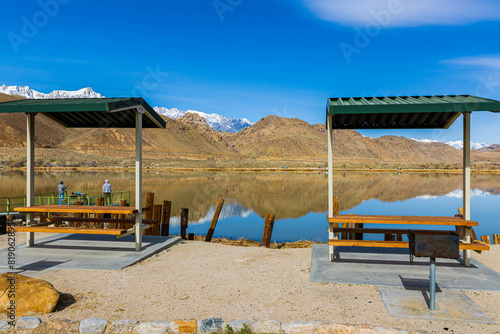 Reflections of The Foothills and Table With The Sierra Nevada Mountain Range on Diaz Lake, Lone Pine, California, USA