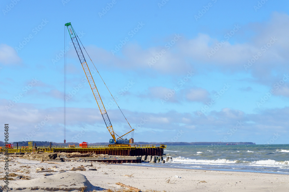 Construction work on the seashore. Laying of oil pipeline and gas pipes. Construction work on the seashore. Laying of oil pipeline and gas pipes.