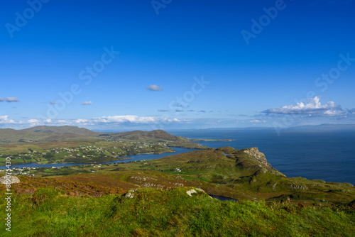 Overlooking a Body of Water From a Hill