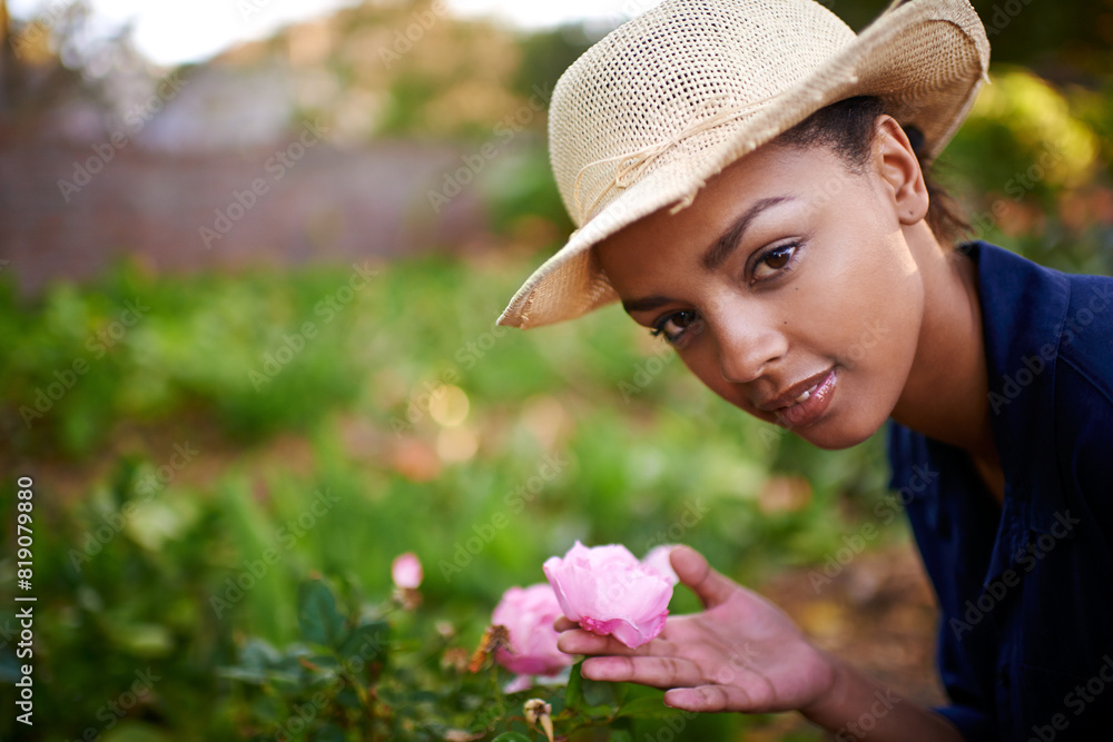 Nature, flowers and portrait of woman gardening for sustainable planting of roses in park. Growth, outdoor and female botanist with pink floral blooming for eco friendly environment in countryside.