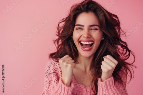 Happy woman clenches her fists feeling euphoric and rejoicing in her success, pink background back, Generative AI.