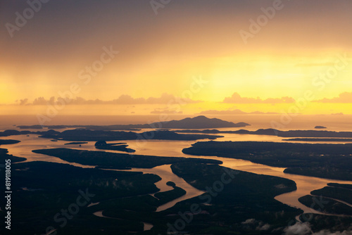Coast of Thailand and Andaman sea in Krabi province at sunset. View from the airplane.