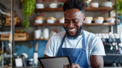 A Barista with a Digital Tablet photo
