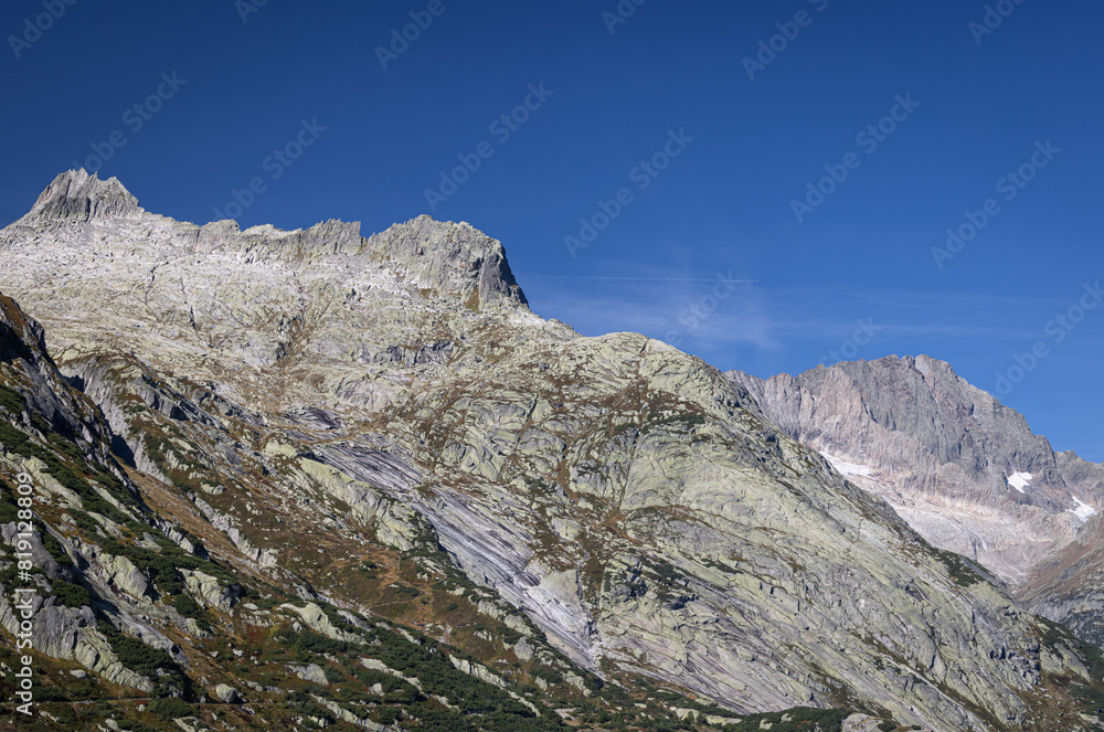 View of Swiss Alps on the Grimsel mountain pass, by Räterichsbodensee (Räterichsboden Lake), Switzerland View of Swiss Alps on the Grimsel mountain pass, by Räterichsbodensee (Räterichsboden Lake), Switzerland