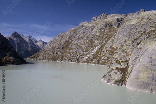 Grimselsee (Lake Grimsel), and surrounding mountains, Switzerland photo