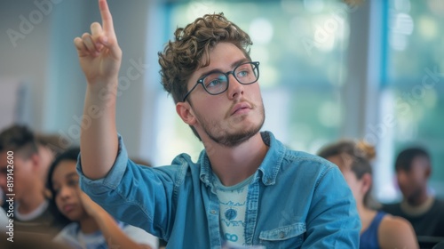 A Student Raising Hand in Class photo