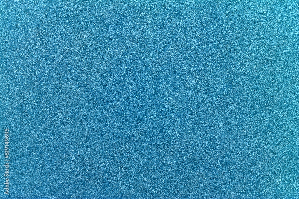 Blue paint background texture with inverted colors resembling a blue