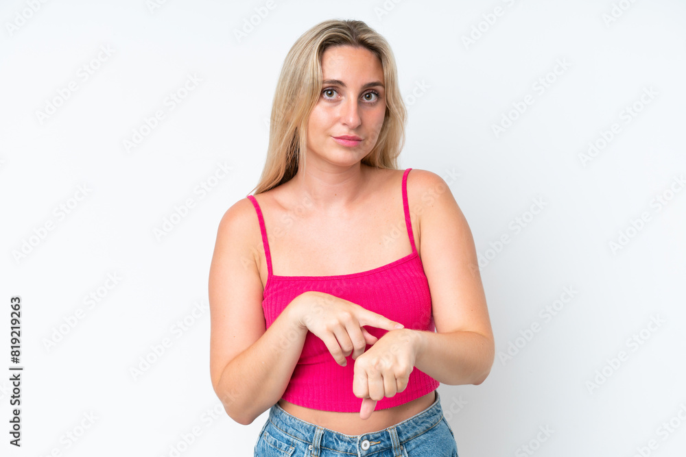 Young caucasian woman isolated on white background making the gesture of being late Young caucasian woman isolated on white background making the gesture of being late
