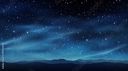 Night sky with stars and silhouettes of mountains.