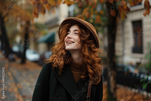 A woman with long red hair wearing a hat. Ideal for fashion blogs and magazines