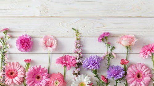 White Wood With Flowers. Pink and Purple Floral Border on White Wooden Background