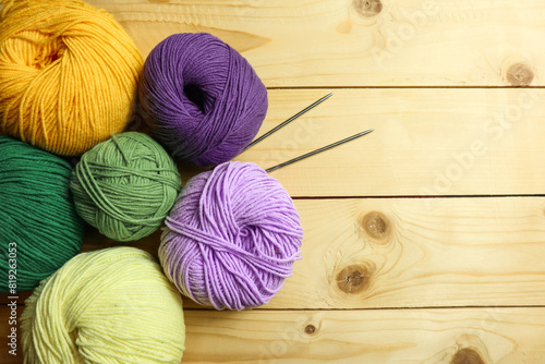 Colorful knitting yarn balls on table