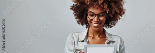 Young Woman Using Tablet Computer