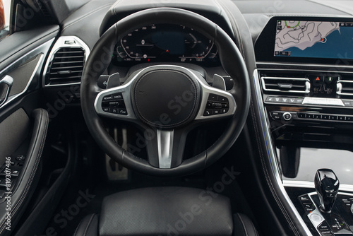 Modern expensive convertible car interior with leather panel, sport seats, multimedia and digital dashboard © Moose