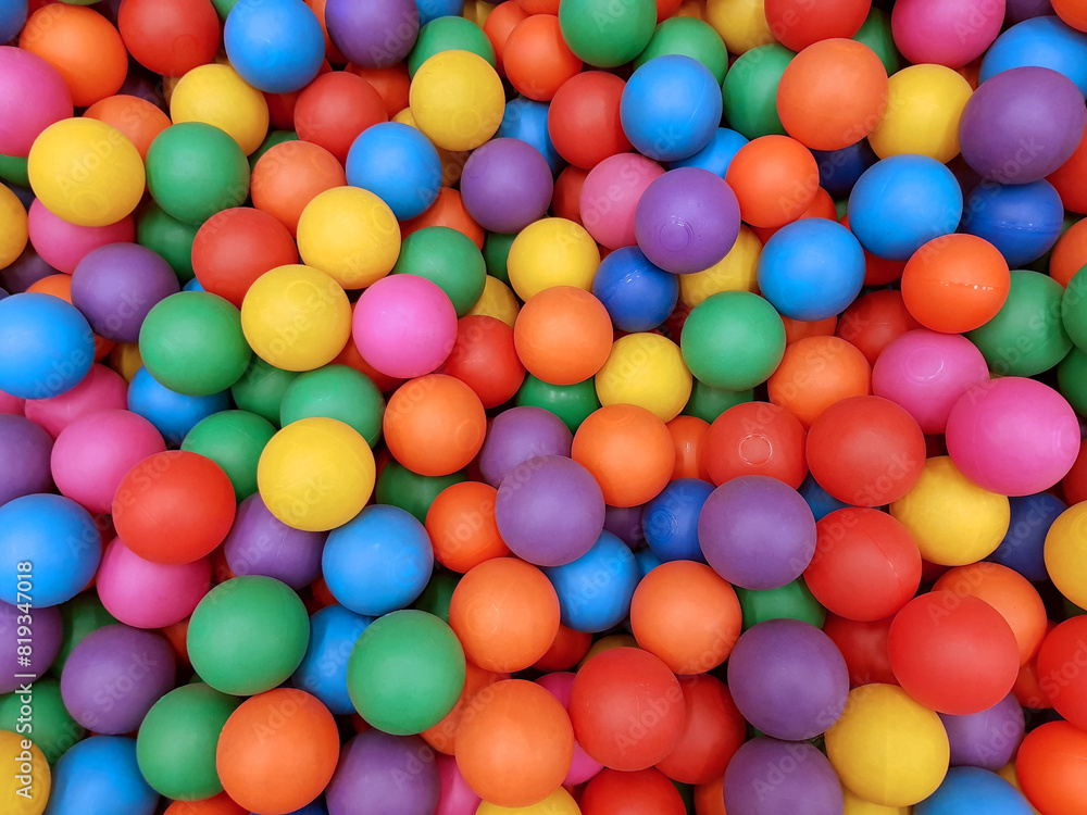 Colorful plastic balls background. Dry children's pool Colorful plastic balls background. Dry children's pool